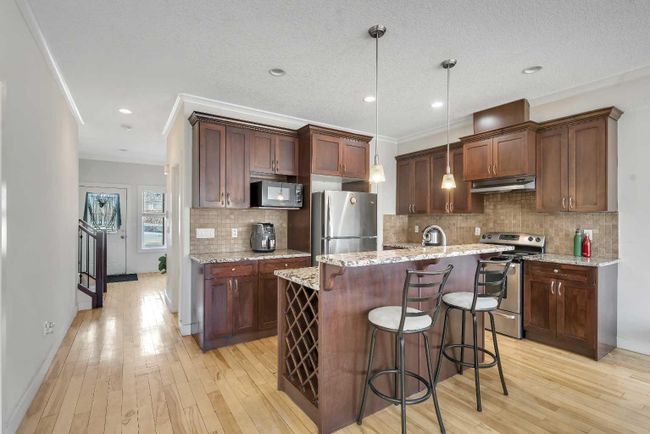 1612 42 Street Sw, Home with 5 bedrooms, 3 bathrooms and 3 parking in Calgary AB | Image 6