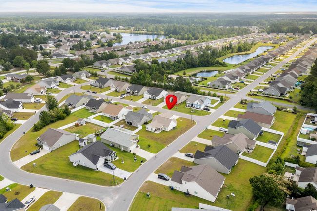 View of property location featuring a nearby body of water and nearby suburban area | Image 28