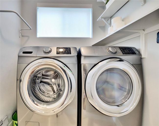 Washroom featuring washer and dryer | Image 10