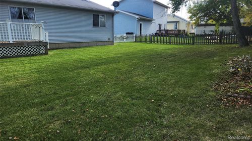 3088 Wild Orchid Ln, Burton, MI, 48519-1583 | Card Image