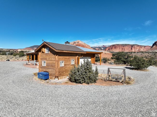 View of side of property with a mountain view and a chimney | Image 12
