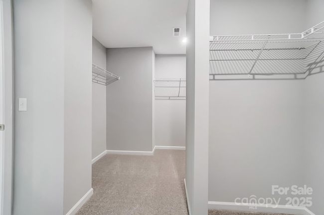 PRIMARY BEDROOM WALK-IN CLOSET | Image 36
