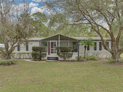 117 E Sunnyside Drive, Home with 3 bedrooms, 2 bathrooms and null parking in Lake Placid FL | Image 1