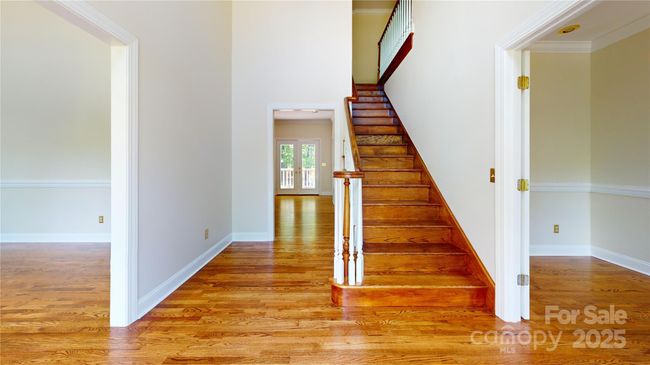 Staircase leading to second floor. | Image 29