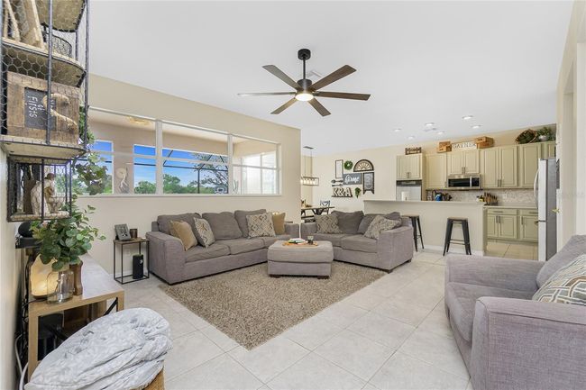 Living Room/ Kitchen/ Dining Room view from Primary Bedroom Doorway | Image 16
