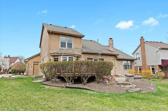 Backyard deck and brick paver patio | Image 24
