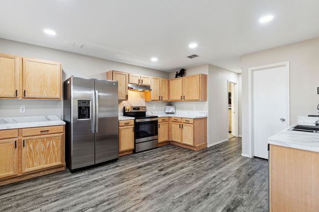 Plenty of cabinets for storage and counter space for prepping | Image 4