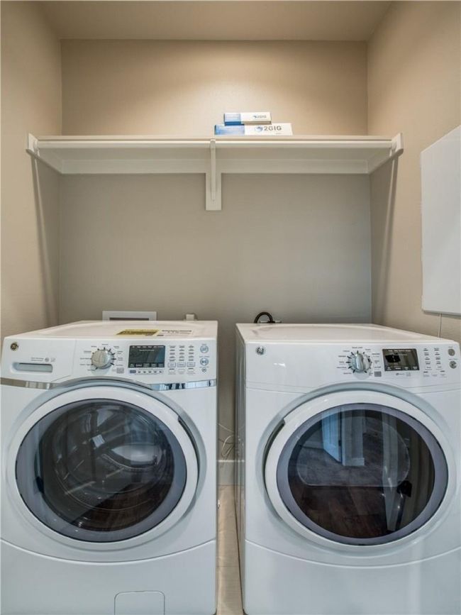Full size washer and dryer in hallway laundry closet. | Image 8