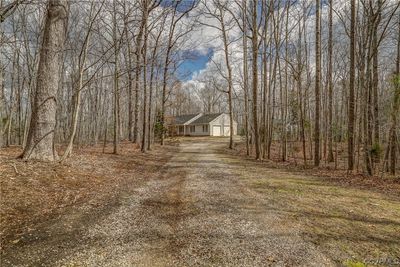 Tons of privacy! 4.73 acres, wooded | Image 2