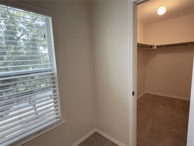 Walk in closet with carpet | Image 31