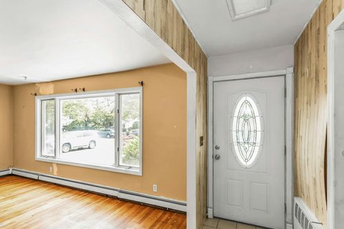 233 Harrison Ave, Island Park, NY, 11558-1321 | Card Image