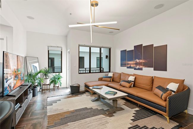 LIVING ROOM WITH CONTEMPORARY LIGHTING FIXTURE | Image 30