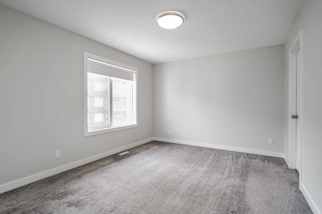 282 Canals Cross Sw, Townhouse with 3 bedrooms, 3 bathrooms and 2 parking in Airdrie AB | Image 18