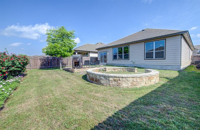 View of yard featuring a fenced backyard | Image 22