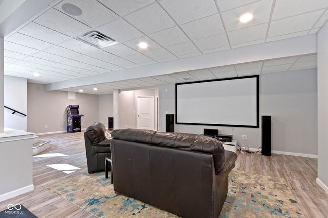 Home theater area with included cinema equipment - HD ultra short throw projector, 120 in. screen, receiver/amplifier and top of the line speakers. | Image 54
