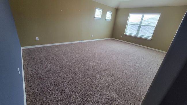 Carpeted spare room featuring baseboards | Image 19