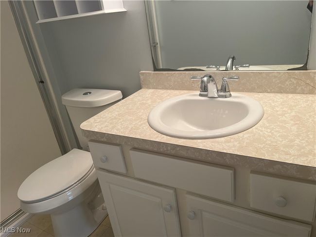 Vanity and toilet in the Primary Bathroom | Image 13