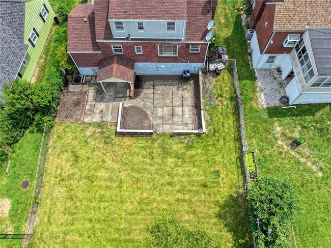 Drone shot of rare flat backyard. | Image 23