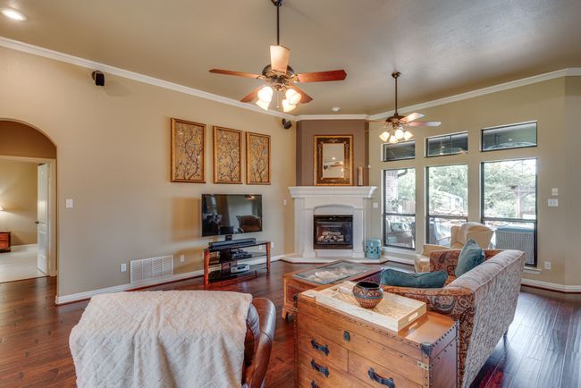 Spacious Living Room, fireplace, ample natural light | Image 5