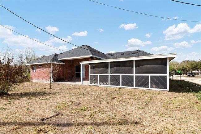 Rear View with Large Screened Patio | Image 14