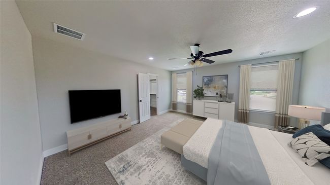 Virtually Staged. Bedroom featuring light carpet, baseboards, visible vents, and a textured ceiling | Image 10