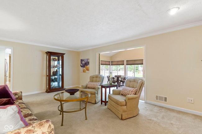 Opens to Grand Sunroom with So Much Natural Light! | Image 19