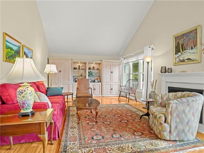 Living room with vaulted ceiling | Image 7