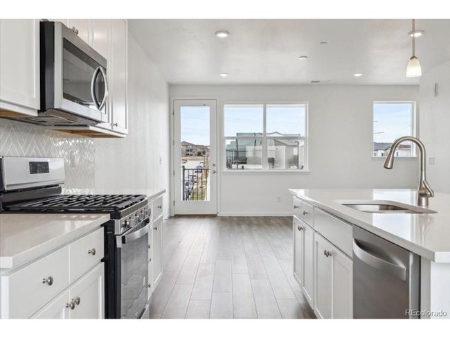 6814 Merseyside Ln, Townhouse with 3 bedrooms, 3 bathrooms and null parking in Castle Pines CO | Image 28