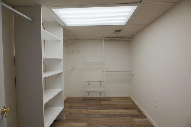 Basement storage with custom closet system. | Image 23