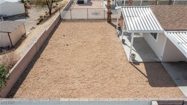 View of yard with a fenced backyard | Image 53