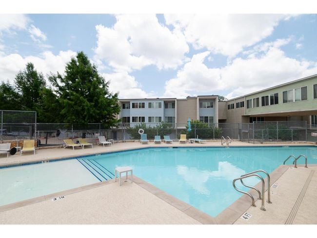 Community pool with a patio | Image 10