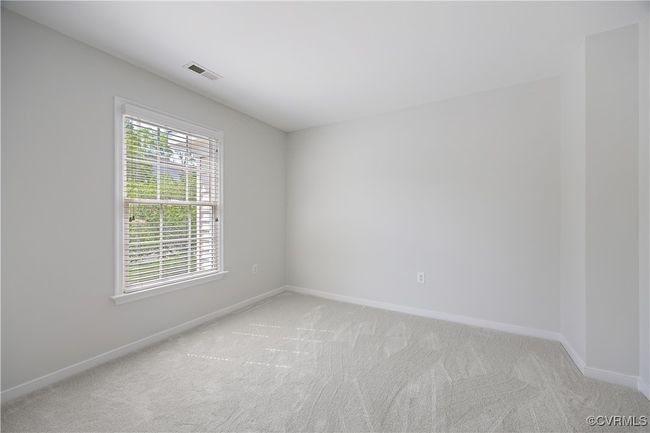 Empty room featuring visible vents, light carpet, and baseboards | Image 34