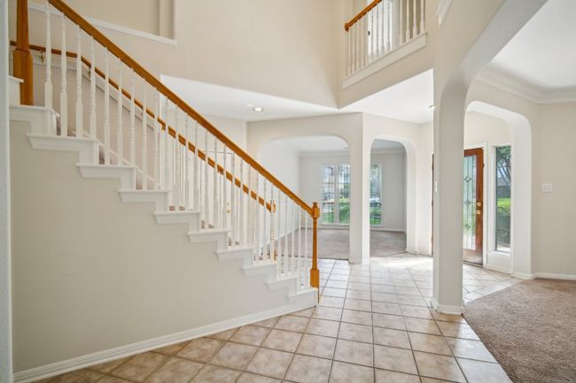 Den is off to the left & Dining Room is off to the right | Image 19