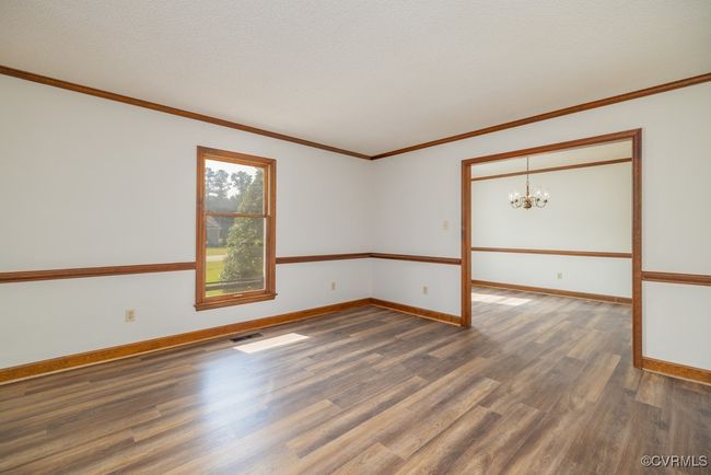 New luxury vinyl tile; joins dining room | Image 10
