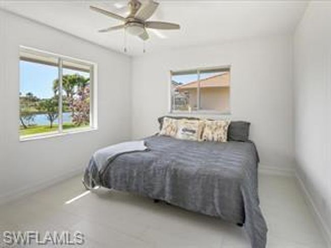 Bedroom with ceiling fan | Image 16