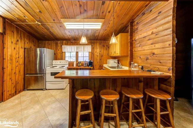 76 29th St N, House other with 2 bedrooms, 1 bathrooms and 10 parking in Wasaga Beach ON | Image 11