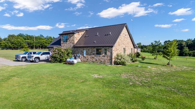 View of side of property featuring stone siding | Image 33