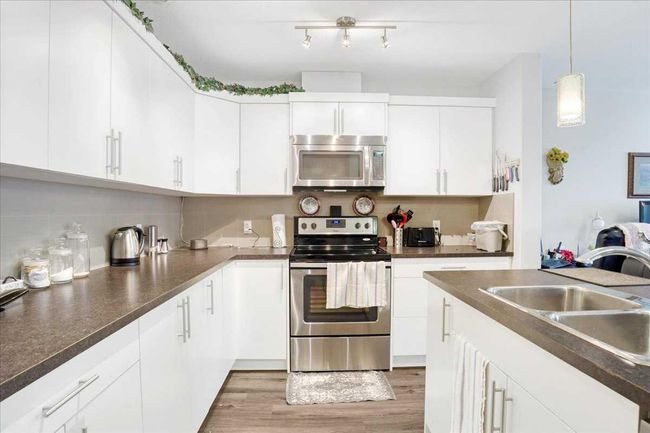 307 Skyview Ranch Grove Ne, Townhouse with 2 bedrooms, 3 bathrooms and 2 parking in Calgary AB | Image 4