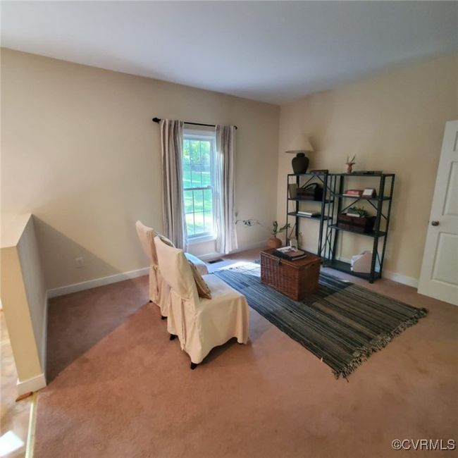 Bedroom with baseboards and carpet | Image 22