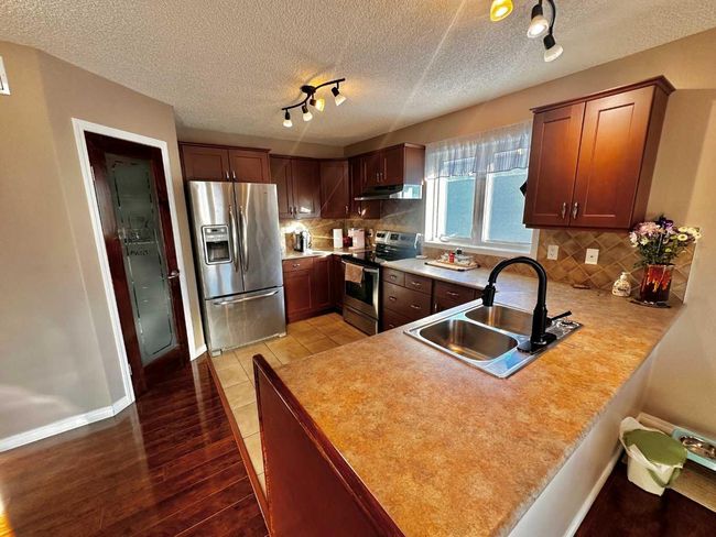 910 29 St, House other with 5 bedrooms, 3 bathrooms and 4 parking in Wainwright AB | Image 5
