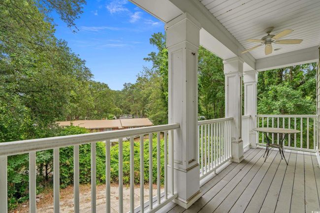 Porch featuring a ceiling fan | Image 24