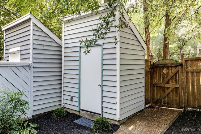 View of outbuilding featuring a gate | Image 39
