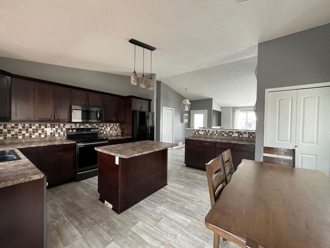 1130 16 Street, House other with 4 bedrooms, 3 bathrooms and 5 parking in Wainwright AB | Image 9