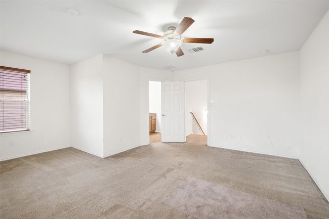 Game room with carpet floors, ceiling fan, and baseboards | Image 22