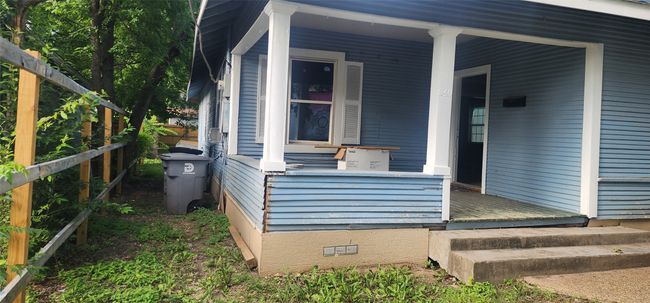View of side of property with covered porch and crawl space | Image 7