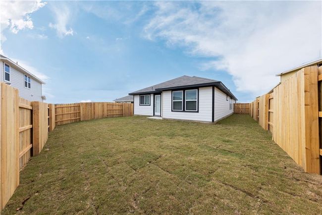 Rear view of house featuring a shingled roof | Image 19