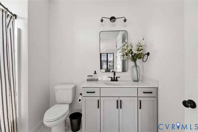Half bath with toilet and vanity | Image 26