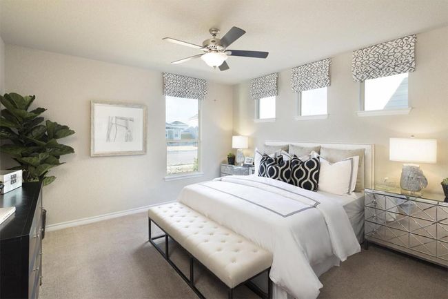Carpeted bedroom featuring baseboards and a ceiling fan | Image 37