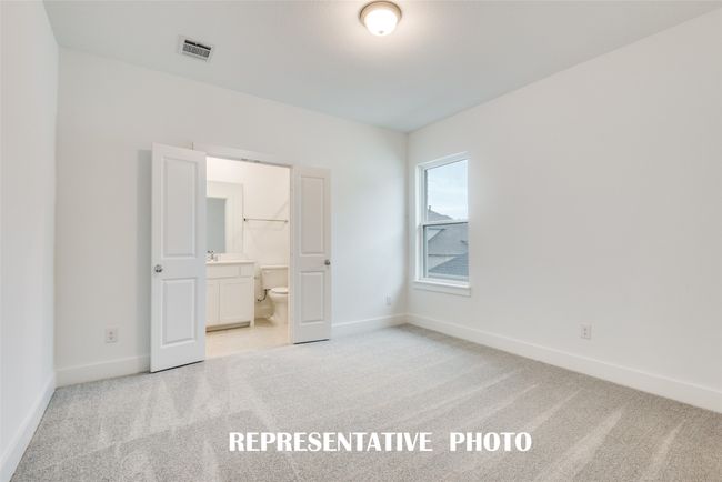 You'll find nicely sized secondary bedrooms in our Grayson II floor plan. REPRESENTATIVE PHOTO. | Image 16