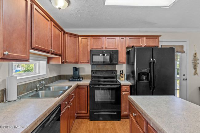 233 Ne 70 Th St, House other with 3 bedrooms, 2 bathrooms and null parking in Oak Island NC | Image 12